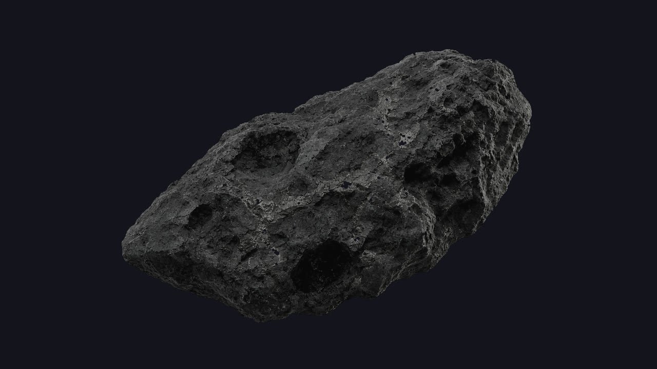 Una piedra volcánica en penumbra, sin nada vivo encima.